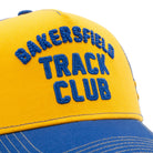 Herren Trucker Cap "Bakersfield Track Club" in Navy & Yellow – Cap von King Kerosin - Ansicht 5